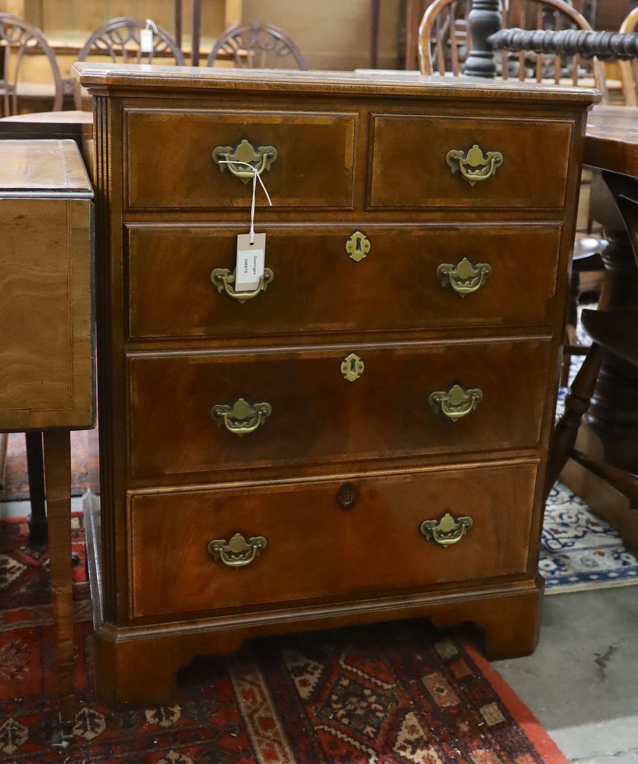 A George II style banded walnut television cabinet with dummy drawer front, width 66cm, depth 45cm, height 82cm